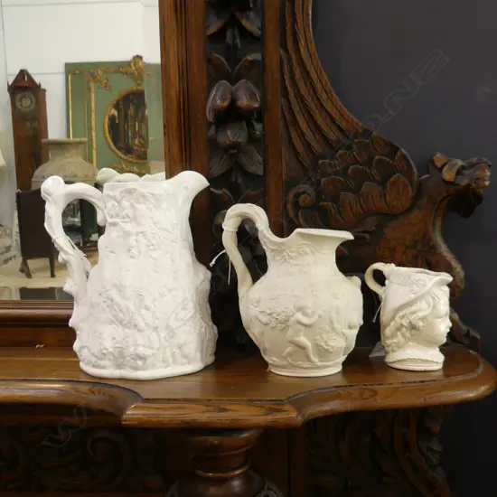 2 PARIAN WARE CHERUB & CHILDREN EMBOSSED JUGS INCL 1 COPELAND (H.215 & 185mm) + SM OLD JUG W CHILD'S FACE  (A.F.) (H.115