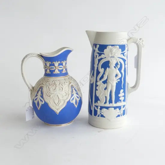 2 ANTIQUE JUGS; W BROWNFIELD COBRIDGE TYROL RELIEF MOULDED BLUE & WHITE SALT GLAZE (H.200mm) + 1 B&W SALT GLAZE H.230mm