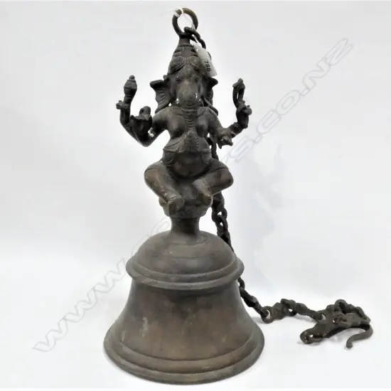 BRONZE BELL SURMOUNTED BY GANESH FIGURE, SUSPENDED ON CHAIN. H.360mm excl chain