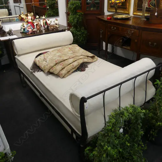 ANTIQUE  IRON FRAMED DAY BED W SQUAB & 2 x BOLSTERS. Original castors. L.1980mm