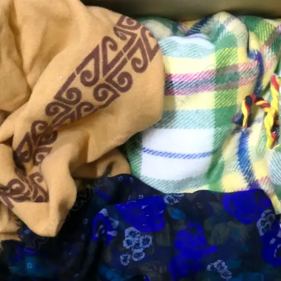 BOX ASST TEXTILES INCL OLD AIR NZ BLANKET, CLERICAL STOLE, TAPESTRY, TRAVEL RUG, HARDY AMIES TIE ETC.