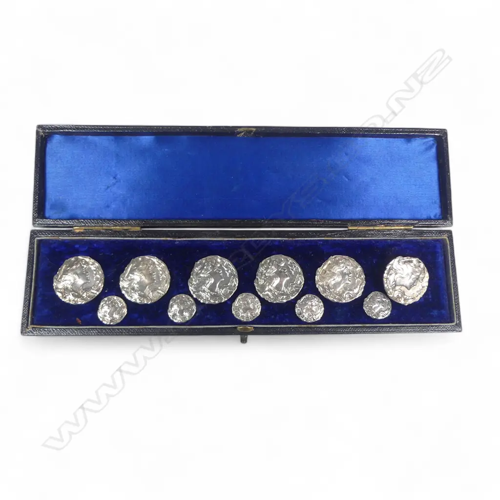 A cased set of six large and six small sterling silver Art Nouveau buttons, by William M Hayes, Birmingham, 1900, Image 1++
