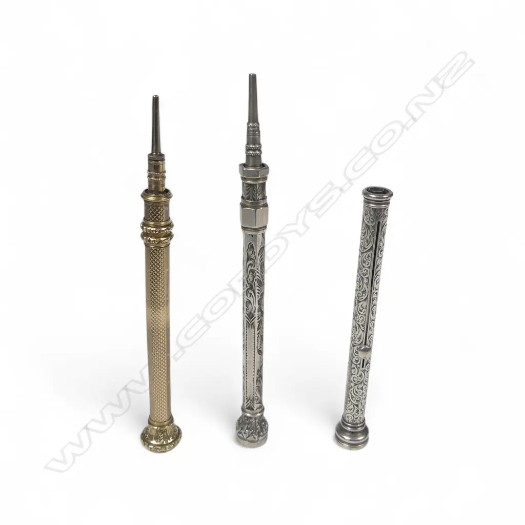 A Victorian sterling silver combination pen and propelling pencil, along with two others, Image 1++