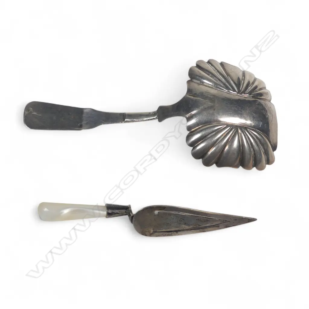 An 19thC silver caddy spoon and a sterling silver and mother of pearl trowel bookmark, Image 1++