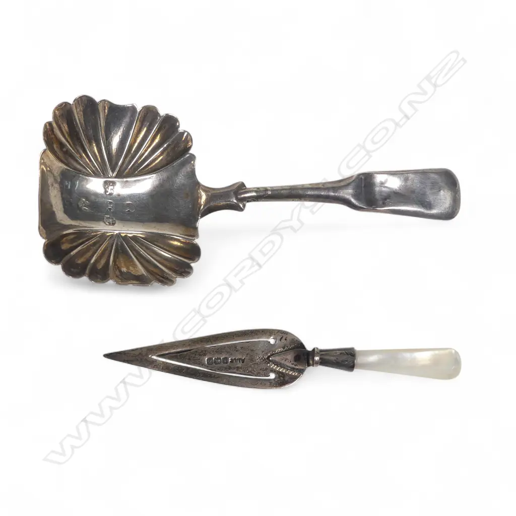 An 19thC silver caddy spoon and a sterling silver and mother of pearl trowel bookmark, Image 1++
