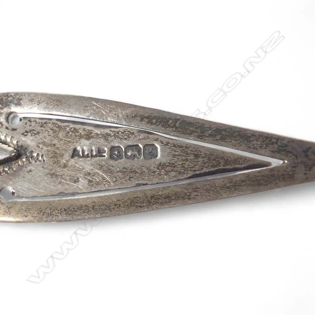 An 19thC silver caddy spoon and a sterling silver and mother of pearl trowel bookmark, Image 1++