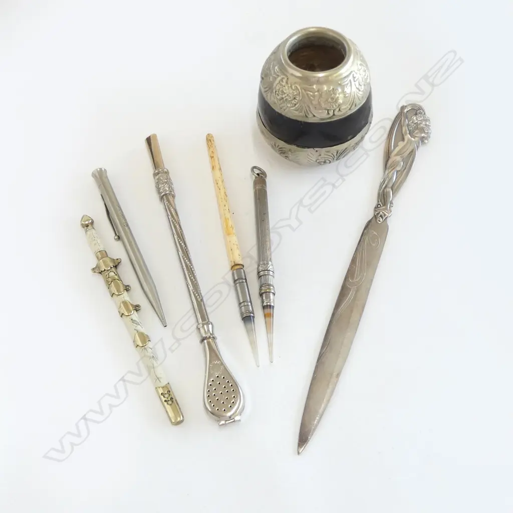 An Argentinian marte gourd and bombilla straw, along with five interesting letter openers and pens, Image 1++