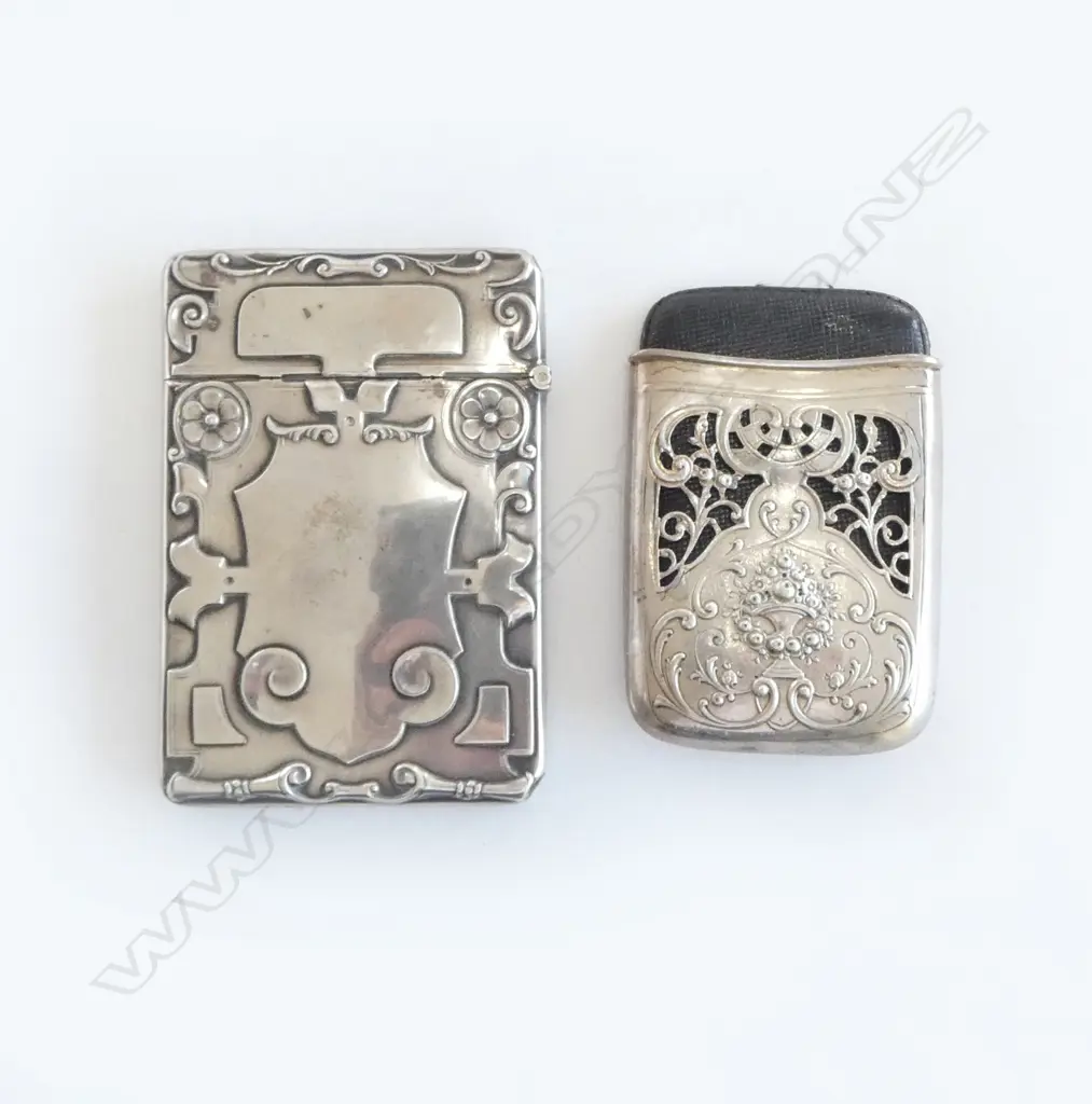 Two silver visiting card cases, one American, one English, Image 1++