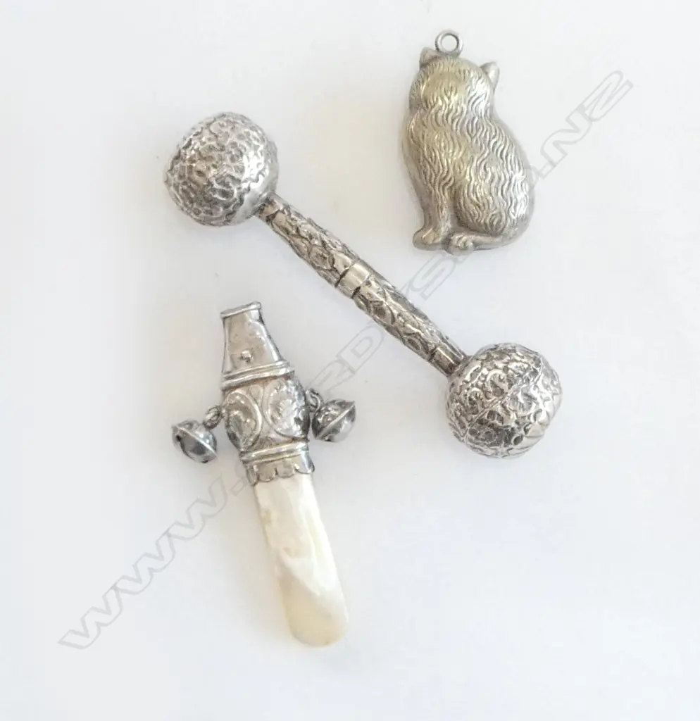 Three silver plated child's rattles, Image 1++