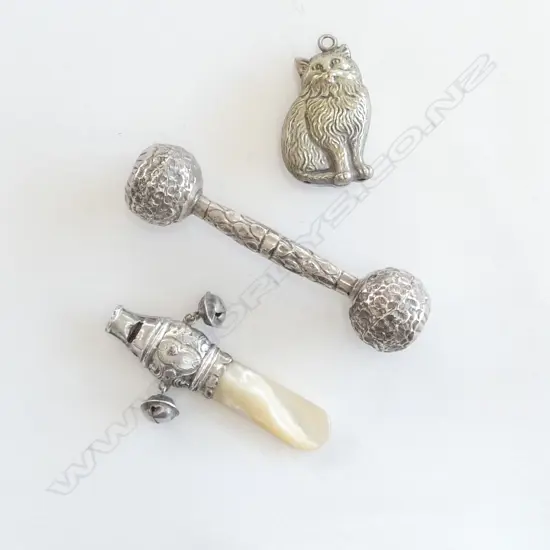 Three silver plated child's rattles,