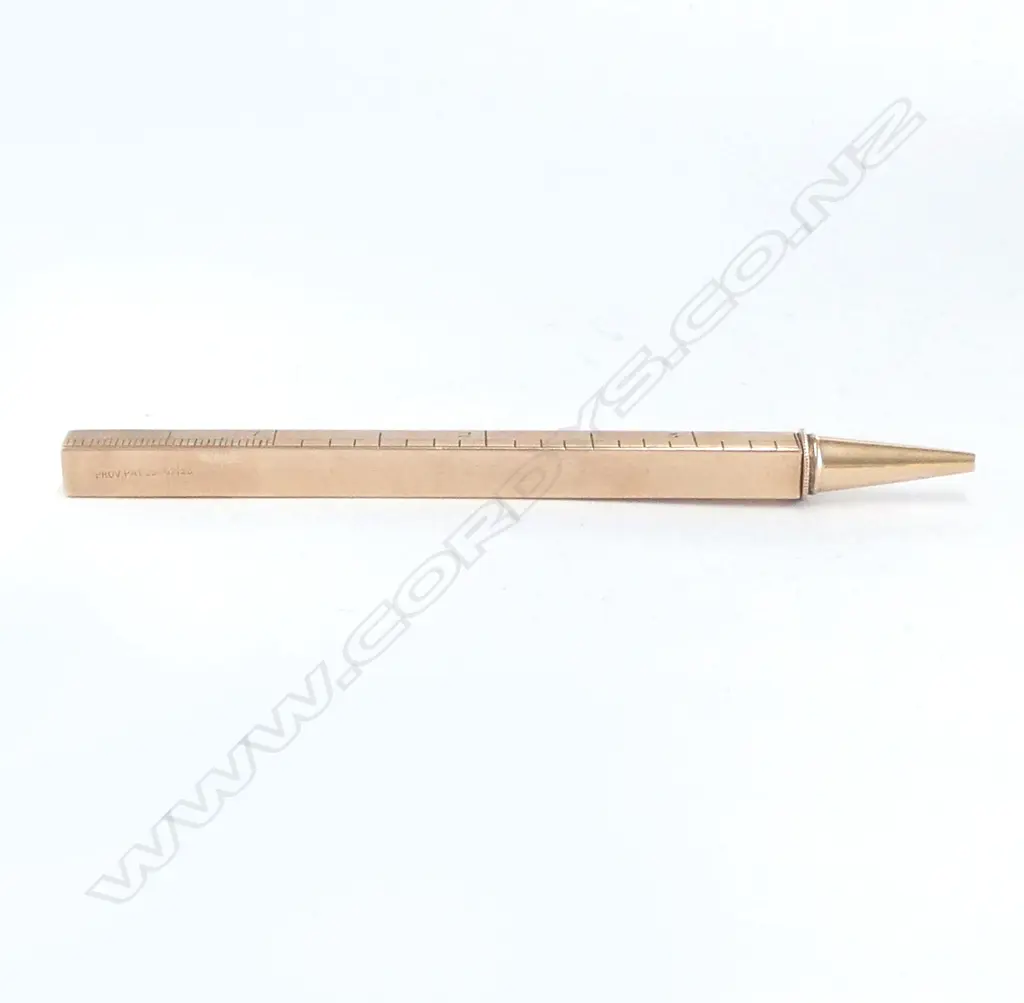 A 9ct gold cased telescoping propelling pencil with engraved ruler scales, Image 1++