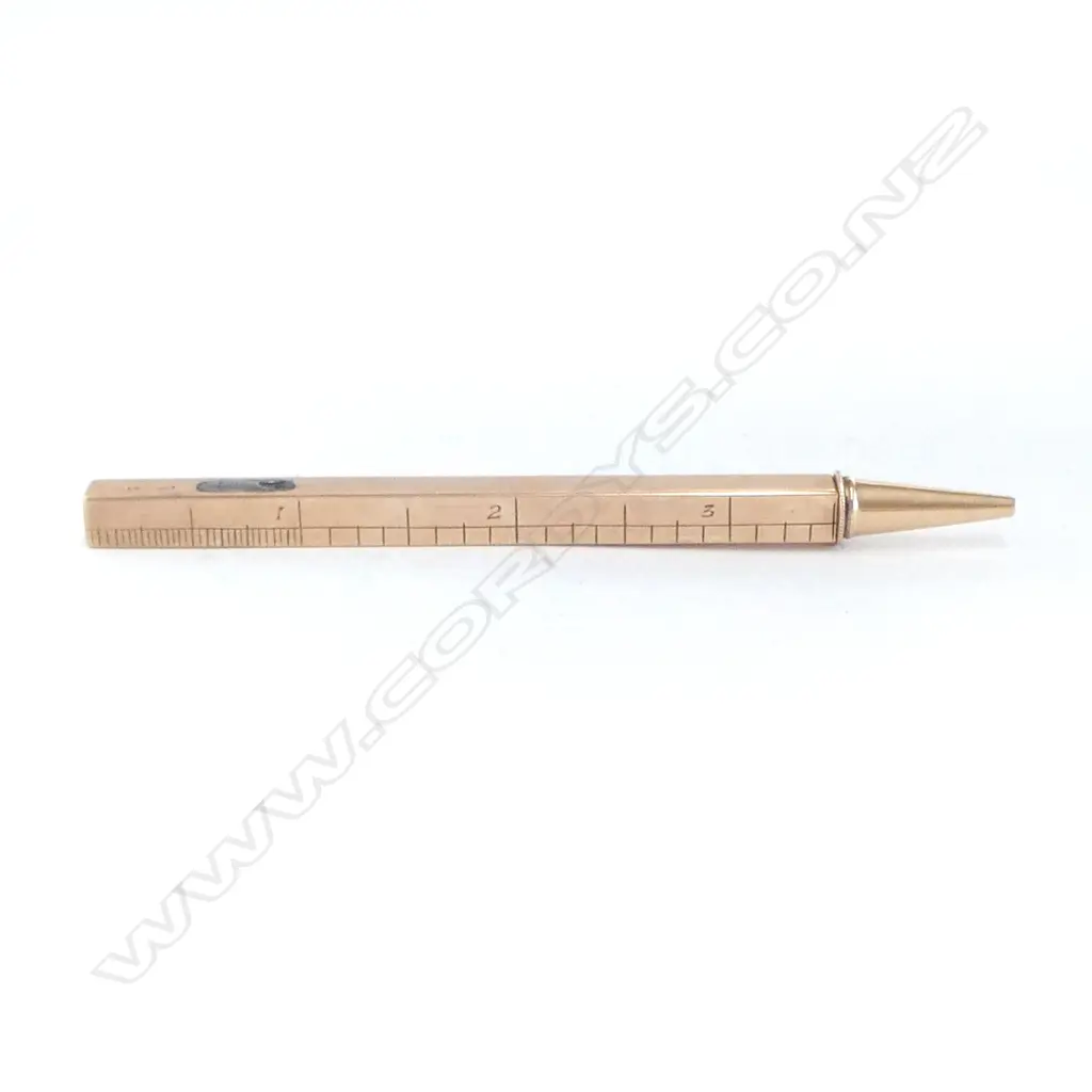 A 9ct gold cased telescoping propelling pencil with engraved ruler scales, Image 1++