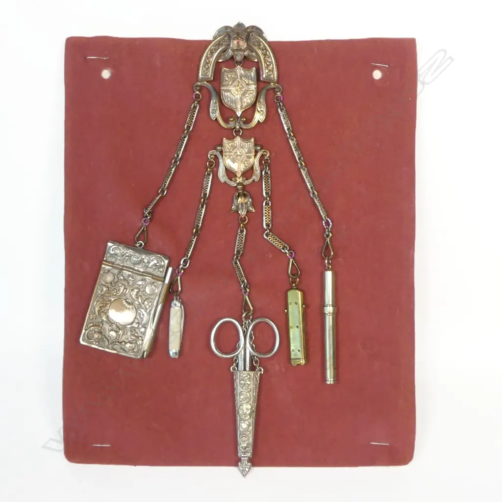 A late 19thC silvered copper chatelaine with five suspended accoutrements, Image 1++