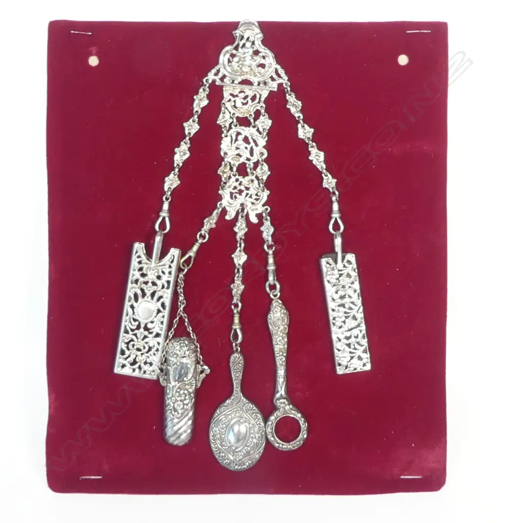 A rococo design sterling silver chatelaine with five suspended accoutrements, hallmarked London 1888 by Rosenthal, Jacob & Co (Julius Rosenthal & Samuel Jacob), Image 1++
