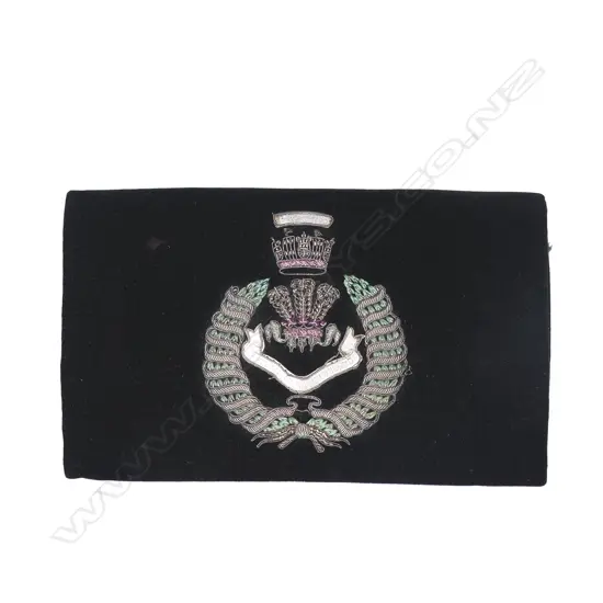 A black velvet evening clutch with Royal Welch (sic) Regimental bullion and embroidery badge to the flap,