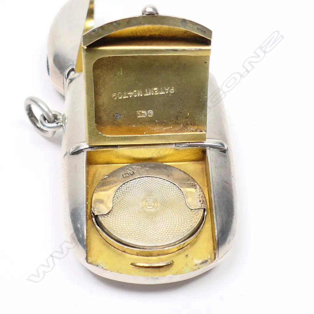 An uncommon sterling silver combination vesta, sovereign and stamp case, with NZ interest, Image 1++