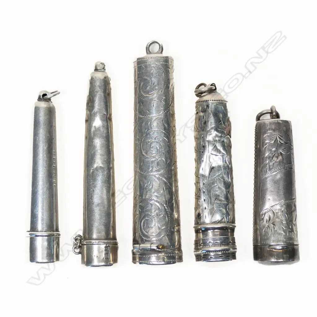 A collection of five silver cigarette holder cases, Image 1++