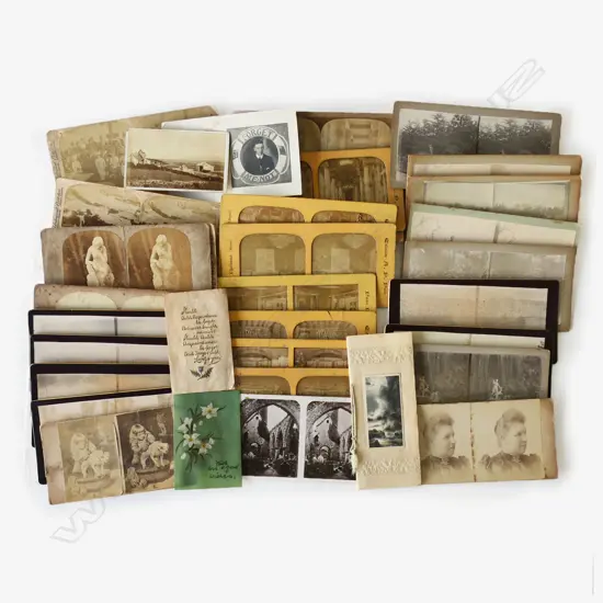 A box of assorted stereoscope photographic cards.