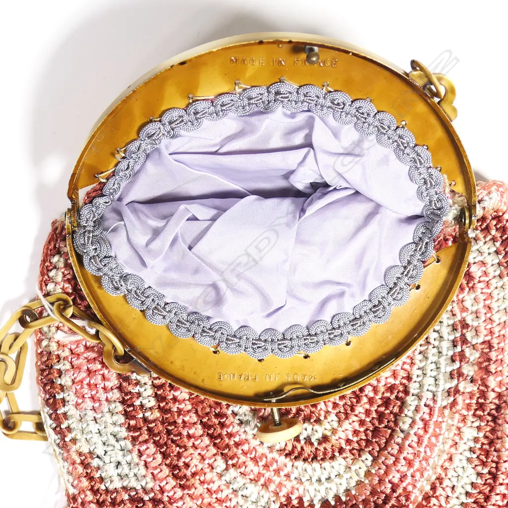 A French Art Deco period crocheted silk handbag with moulded celluloid frame, Image 1++