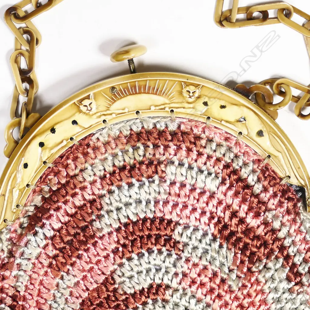 A French Art Deco period crocheted silk handbag with moulded celluloid frame, Image 1++