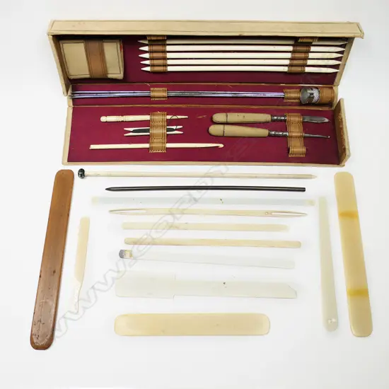 A fold-out box set of needlework implements and a collection of netting gauges and needle.