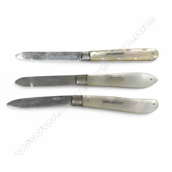 Three mother of pearl handled, folding sterling silver bladed fruit knives, various dates and makers.