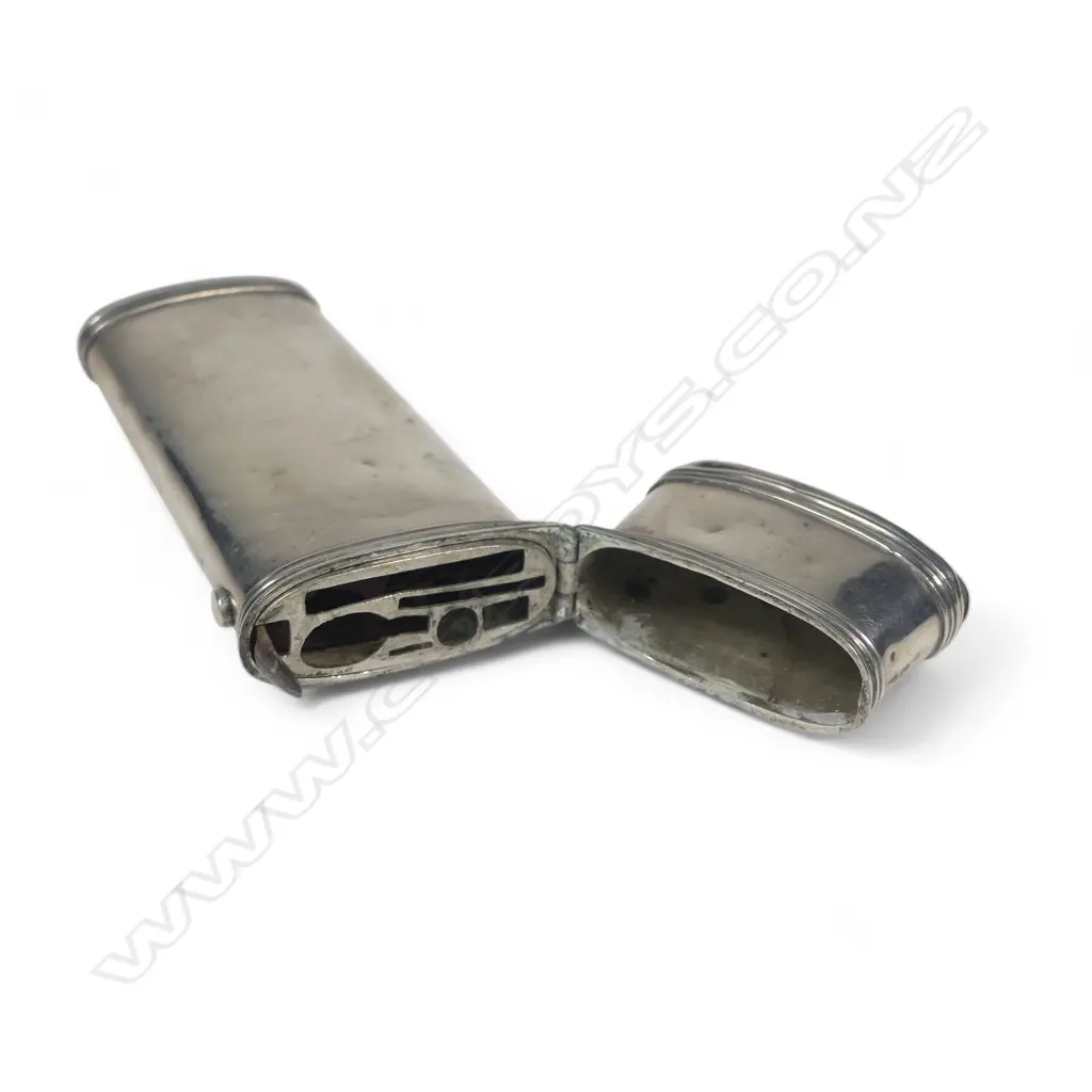 A Georgian period silver étui of plain tapering oval section with reeded borders, contents absent. L.90mm. Some faults Image 1++