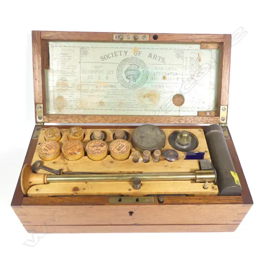 A near complete English c.1880,two-layer mahogany boxed, blowpipe analysis set, with Society of Arts label with index to inside of lid,