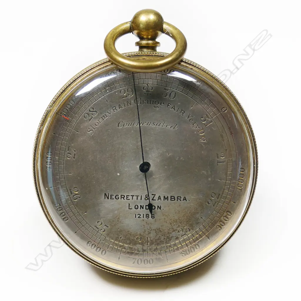 A brass cased compensated pocket barometer-altimeter by Negretti & Zambra, London, No.12186, Image 1++