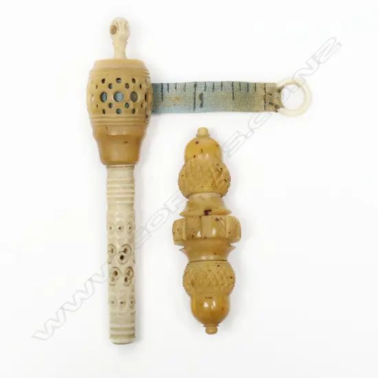 A Stanhope (Rotorua, NZ) ribbon tape measure and a needle case,