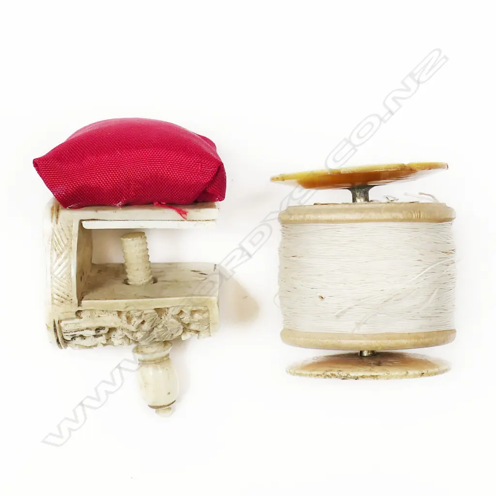 A Chinese carved ivory sewing clamp with a bone and mother of pearl bobbin spool, Image 1++