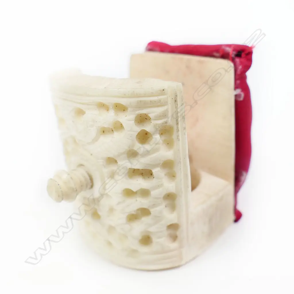 A Chinese carved ivory sewing work clamp with affixed pincushion and a bone Stanhope pincushion. Image 1++