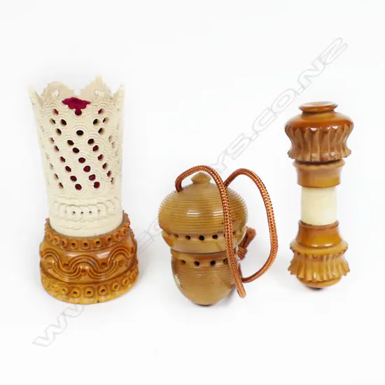 Three items of Coroza nut and bone, a standing pincushion, an acorn pomander thimble case and a bodkin case,