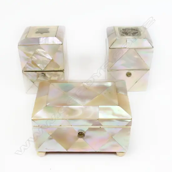 Three miniature mother of pearl covered caskets, each with contents: