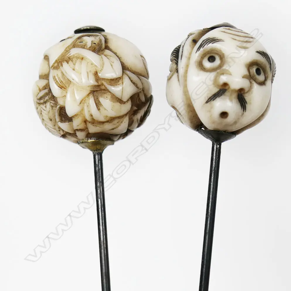 An Ivory dice cup containing a selection of letter knives, hat pins, etc, Image 1++