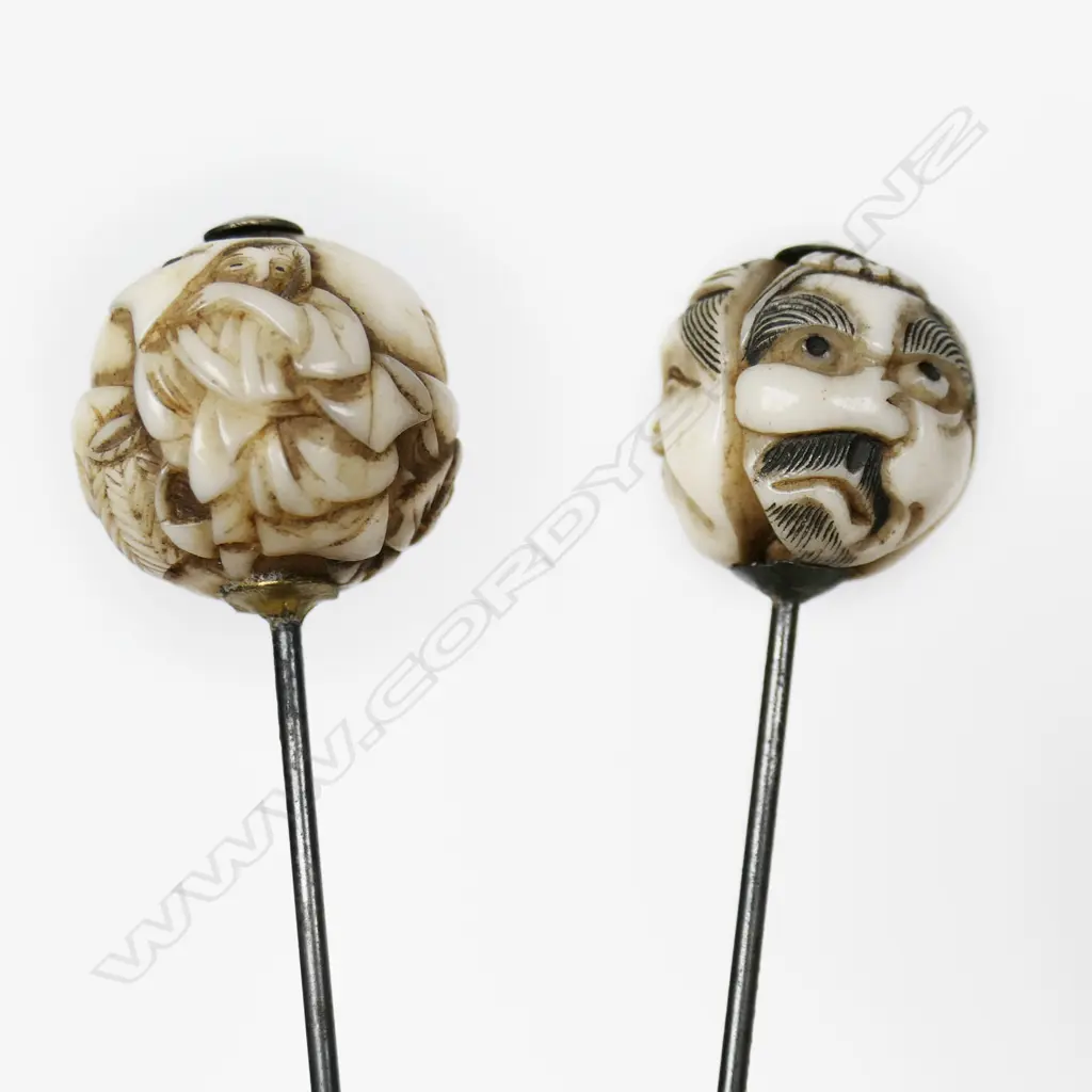 An Ivory dice cup containing a selection of letter knives, hat pins, etc, Image 1++