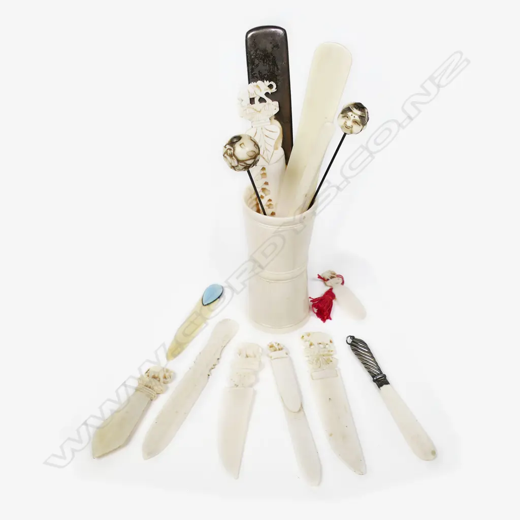 An Ivory dice cup containing a selection of letter knives, hat pins, etc, Image 1++