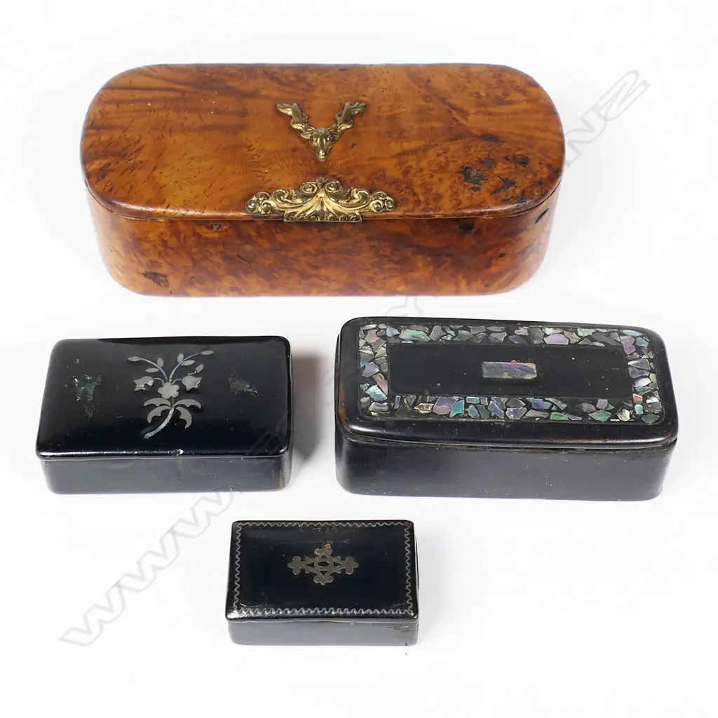 Four various snuff boxes, the largest of burr walnut with gilt metal thumb-piece and stag-head crest, W.100mm, Image 1++