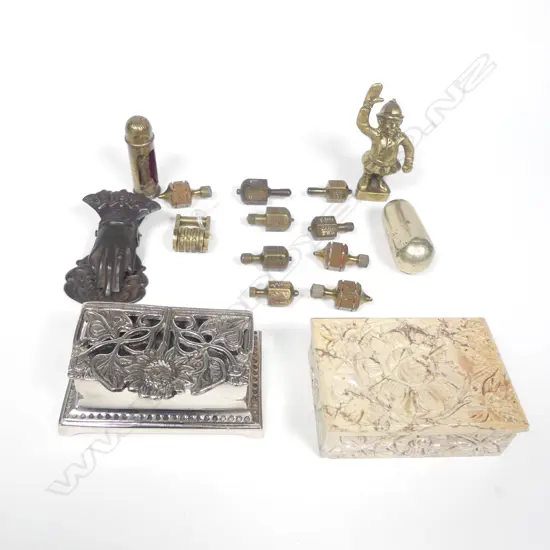 A collection of miscellany including stamp boxes, a metal hand letter clip, Put and Take games spinners, metal canisters, figure, etc.