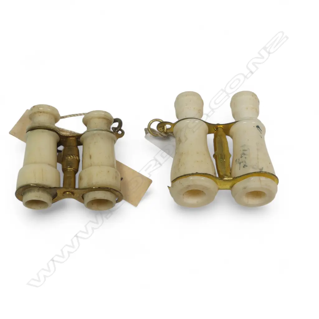 Two miniature bone and gilt metal Stanhopes binoculars, one of the Dunedin Expo, the other Selworth. Image 1++
