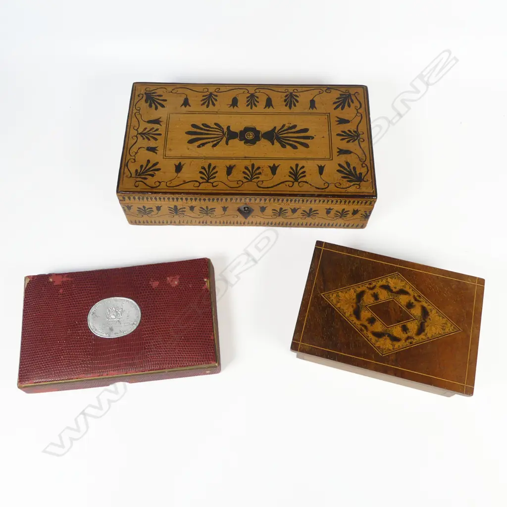 Small wooden box containing cigar piercers, bone cigarette holders and risqué monocular viewer. With a pen-work decorated box and set of Thomas de la Rue 'Pneumatic' playing cards Image 1++