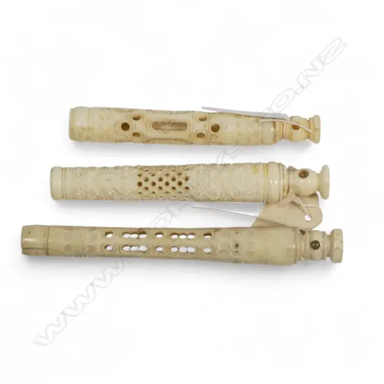 Three circle cut bone needle cases, two with Stanhopes, one 'N.Z., A Souvenir of Wellington' four views,