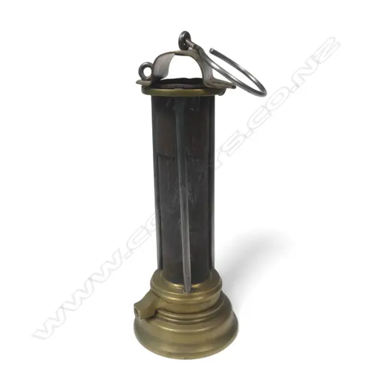 A miner's brass Safety Lamp, c.1900 Thomas & Williams style. The body being a long gauze section protected by three bars. H.235mm.