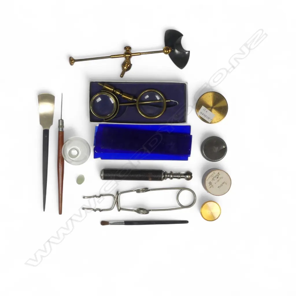 A selection of microscope slide preparation instruments, blue glass slides, covers, bullseyes, etc. Image 1++