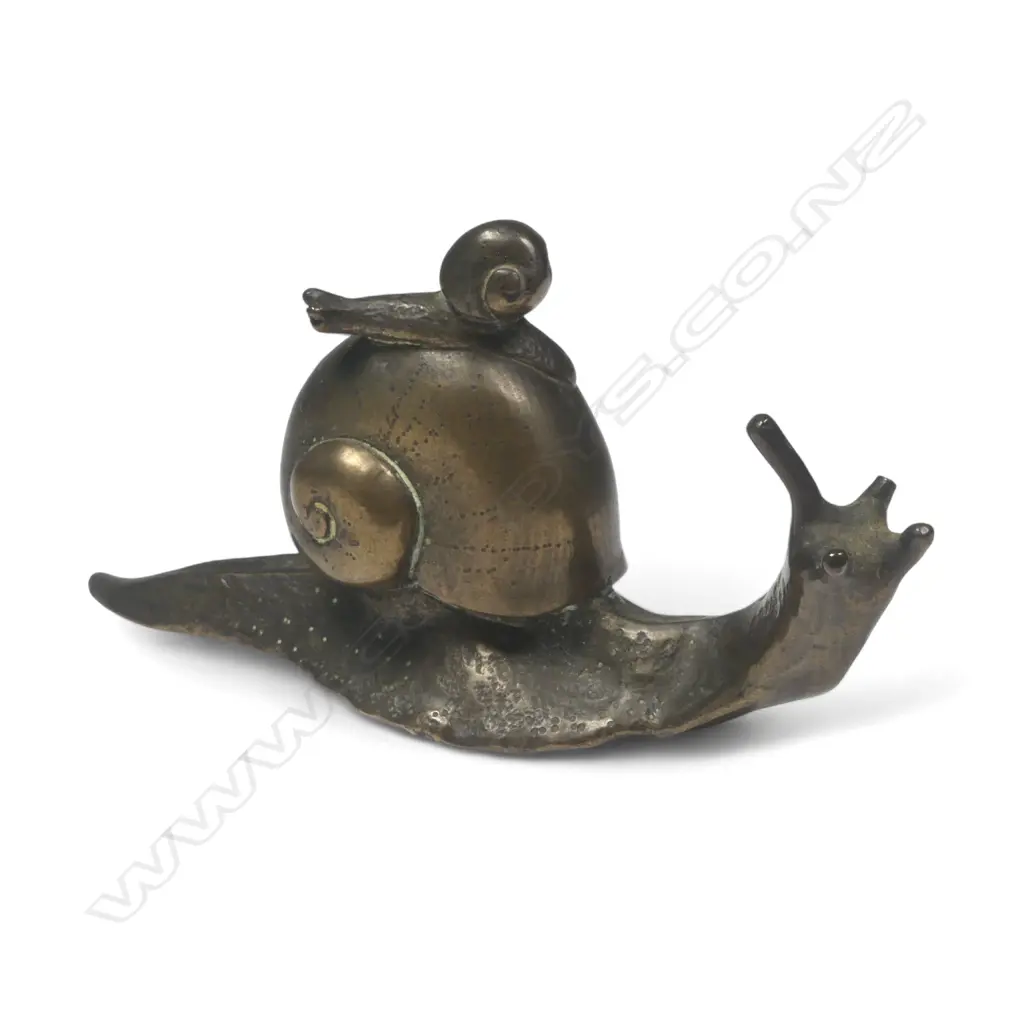 A life size bronze snail sculpture, a baby snail riding on the larger shell. L.85mm Image 1++