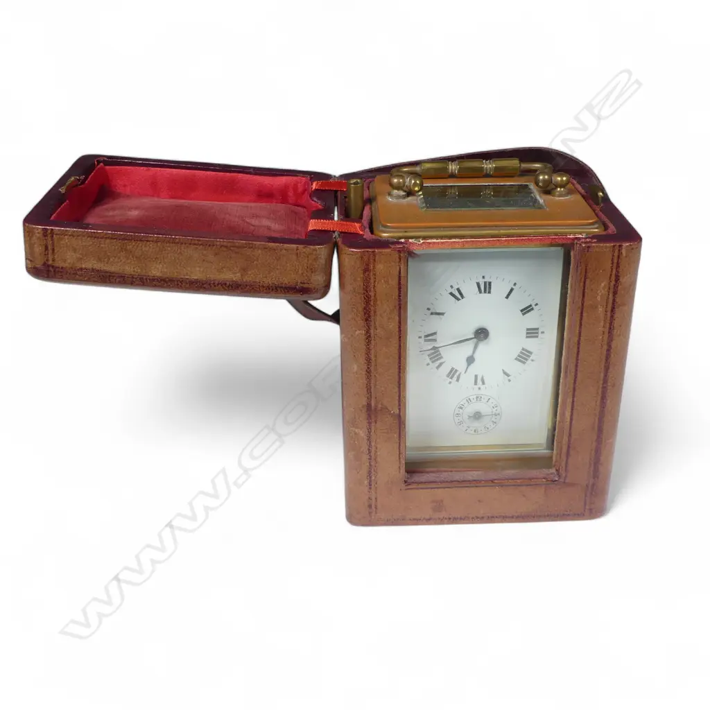 A French brass cased carriage clock in leather travel case, Image 1++