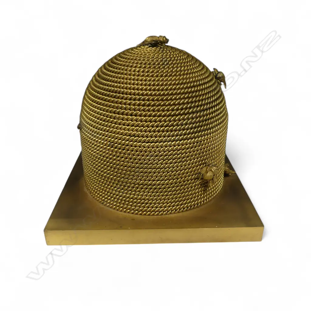 A good mid-Victorian George Betjemann & Sons gilt-metal bee skep sewing box, of classic beehive shape of straw rope twist, surmounted by bees, on a square plinth base with recessed feet. Image 1++