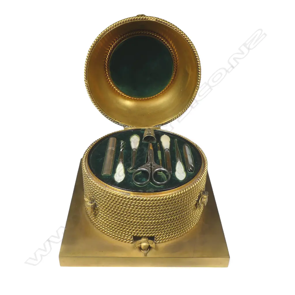 A good mid-Victorian George Betjemann & Sons gilt-metal bee skep sewing box, of classic beehive shape of straw rope twist, surmounted by bees, on a square plinth base with recessed feet. Image 1++