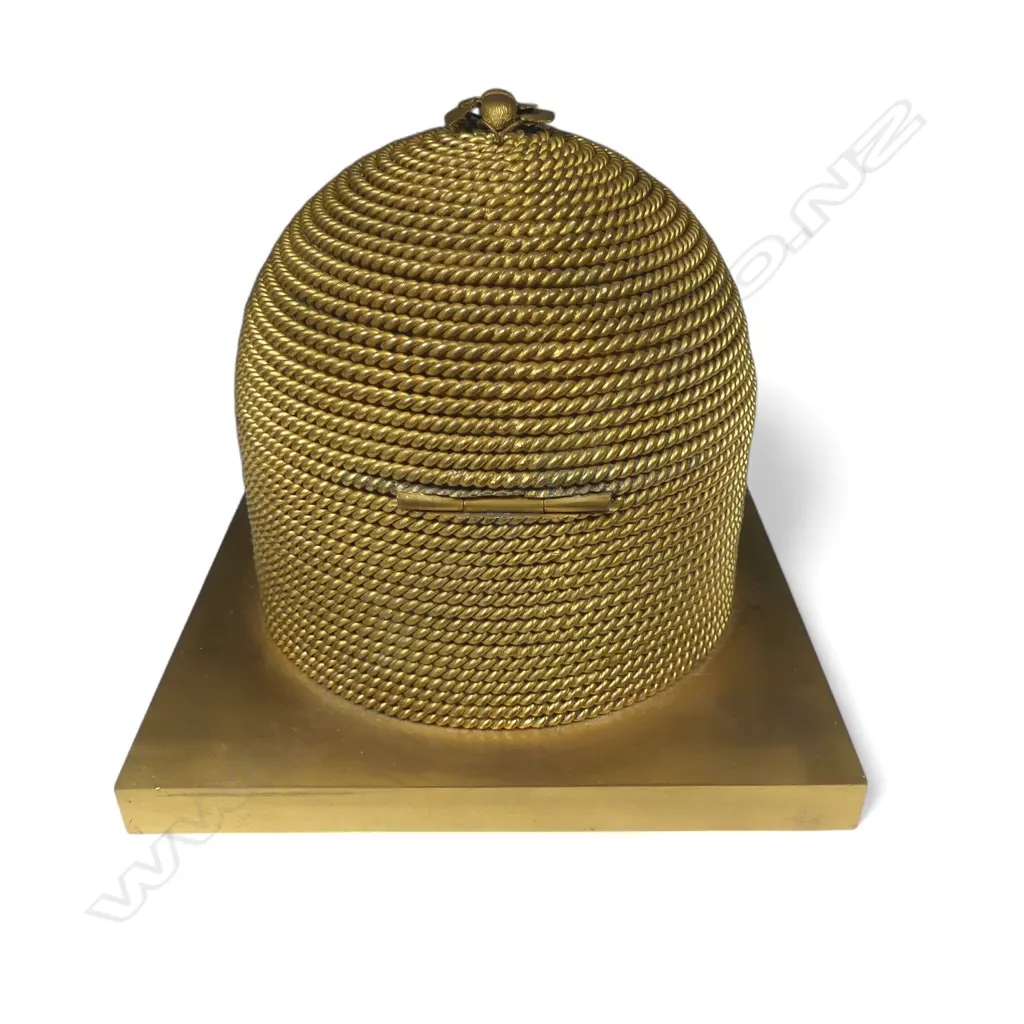 A good mid-Victorian George Betjemann & Sons gilt-metal bee skep sewing box, of classic beehive shape of straw rope twist, surmounted by bees, on a square plinth base with recessed feet. Image 1++