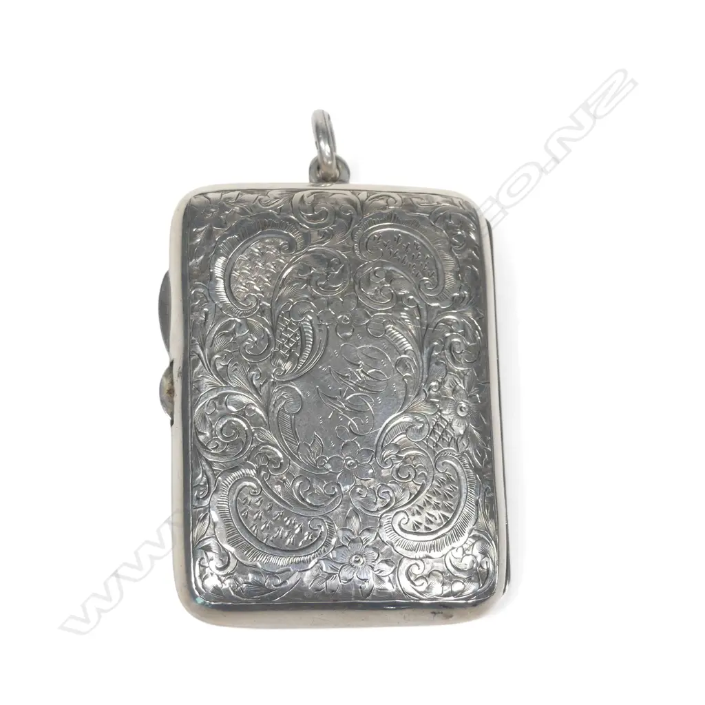 An Edwardian silver combination cigarette case fitted with sovereign and half-sovereign sprung silo holders,  a sprung stamp holder and a space for a small cigarette holder. Image 1++